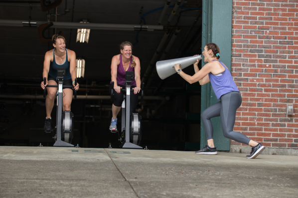 People riding BikeErgs next to each other